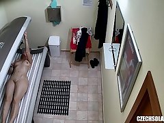 Older MILF Tanning her Shaved Tight Pussy
